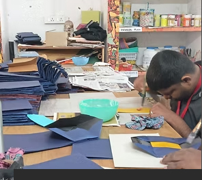 A participant decorating a handmade box